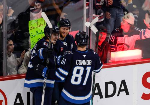 John Woods / THE CANADIAN PRESS
                                The Winnipeg Jets top trio are off to a hot start this season. From left: Mark Scheifele, Gabriel Vilardi and Kyle Connor celebrate Vilardi’s goal against the Pittsburgh Penguins on Saturday.