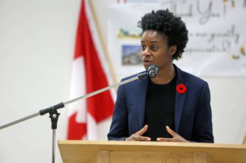 Manitoba Health Minister Uzoma Asagwara addresses a crowd of Hamiota residents at a town hall meeting in the community on Friday. (Connor McDowell / The Brandon Sun)