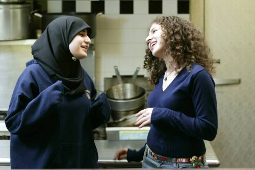Mike Derer / The Associated Press Files
                                Like these two teens, one a Muslim and the other a Jew, working at a homeless in Union City, N.J., in 2006, Torontonian Yafa Sakkejha and Montrealer Avi Finegold are doing a podcast together to bridge divides and foster conversation.