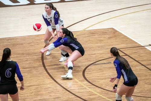 BROOK JONES/FREE PRESS
                                Vincent Massey Vikings left side Hannah McGregor bumps the ball during second set action.