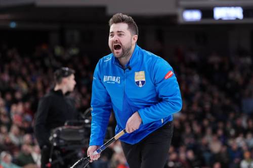 Darren Calabrese / THE CANADIAN PRESS
                                Skip Matt Dunstone yells instructions to teammates Thursday during semifinal of the Canadian Olympic curling trials in Halifax.
