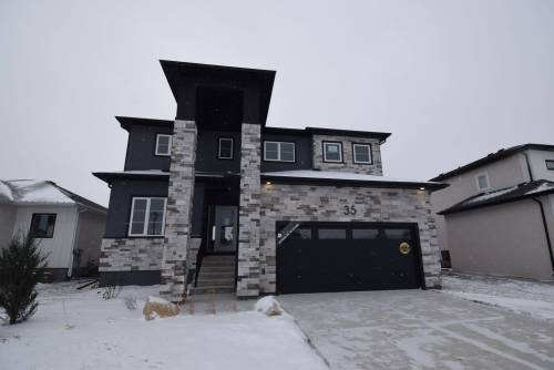 The 2,184-sq.-ft., two-storey home&rsquo;s interior matches its handsome exterior with a perfect blend of functionality and flair.