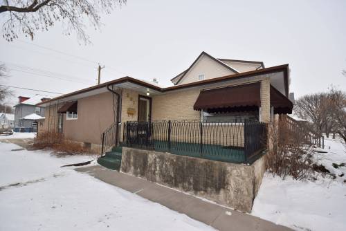 The solid, well-loved bungalow offers exceptional value and livability throughout.