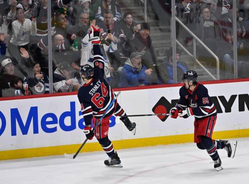 Fred Greenslade / THE CANADIAN PRESS
                                Winnipeg Jets defenceman Logan Stanley (left) celebrates his goal against the Ottawa Senators with Mark Scheifele on Monday. Stanley is currently tied for fourth among all NHL defencemen in even strength goals.