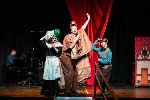 MIKAELA MACKENZIE / FREE PRESS
                                From left: Theresa Thomson (the dame), Christopher Dunn (the pony) and Cyan Gargo (Jax) perform a scene of the Merry Crip-mas Panto.