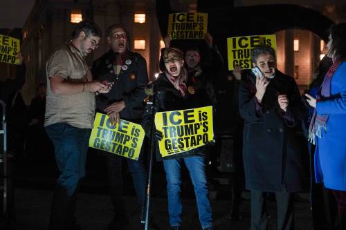 Ryan Murphy / The Associated Press
                                A protest in response to the fatal shooting of Renee Nicole Good.