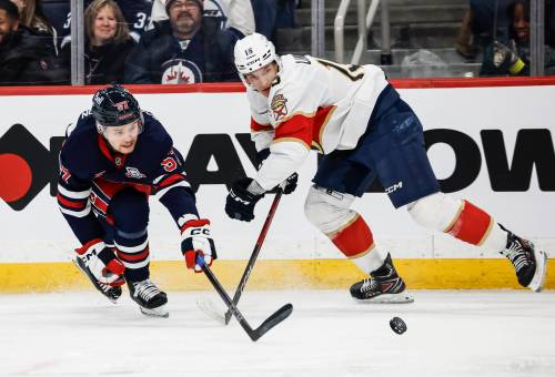 John Woods / The Canadian Press files
                                Winnipeg Jets defenceman Elias Salomonsson (left) continues to impress in his development, playing in just his 10th NHL game Thursday night against Tampa Bay.