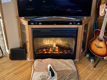 Photos by Marc LaBossiere / Free Press
                                The bulky Dimplex log-box electric fireplace is still in use within the corner entertainment cabinet shelving unit in our living room.