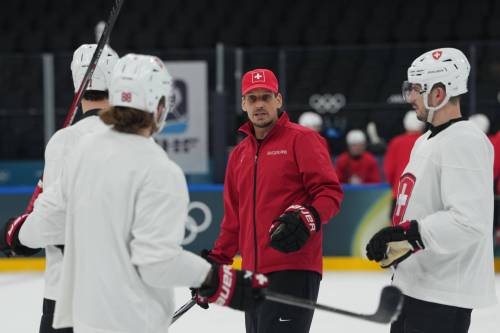 CAROLYN KASTER / THE ASSOCIATED PRESS
                                Switzerland&rsquo;s head coach Patrick Fischer talks his players during practice on Sunday in Milan. Fischer shone on the high school hockey team&rsquo;s Carman Cougars roster in his youth.