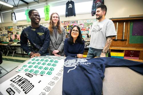 MIKAELA MACKENZIE / FREE PRESS
                                From left: Elmwood High School students Tobi Famisa, Xander Woodley and Audrina Moore and teacher Matthew Reis