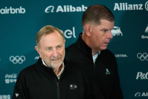 Petr David Josek / THE ASSOCIATED PRESS
                                NHL commissioner Gary Bettman (left) and NHLPA executive director Marty Walsh said at a press conference today in Milan, alongside IIHF president Luc Tardif, that they hope to have best-on-best men&rsquo;s hockey tournaments every two years.
