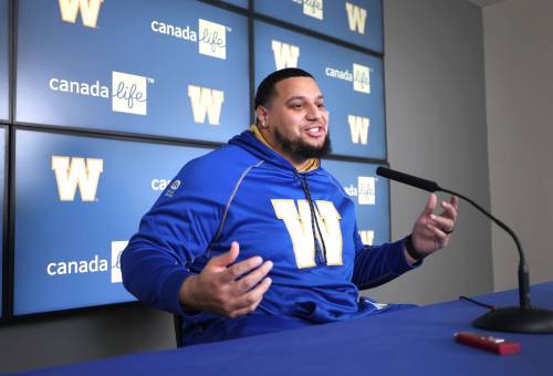 Ruth Bonneville / Free Press
                                Jarell Broxton is interviewed by reporters at Princess Auto Stadium on Thursday after the Blue Bombers signed the offensive lineman in CFL free agency earlier in the week.
