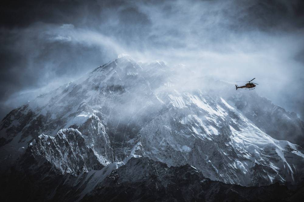 Merit Motion Pictures
                                A group of Sherpa climbers ascend Mount Everest to bring down a body in order to restore peace to the mountain.