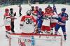 JULIEN DE ROSA / THE ASSOCIATED PRESS
                                Players scuffle during a preliminary round match of men&rsquo;s hockey between the United States and Denmark at the 2026 Winter Olympics, in Milan, Italy on Saturday.