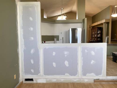 Marc LaBossiere / Free Press
                                A partial wall is introduced during the shell prep stage of a kitchen reno to better suit the enhanced design layout of the new cupboards.