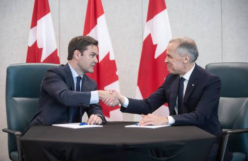 JASON FRANSON / THE CANADIAN PRESS FILES
                                Prime Minister Mark Carney and MP Matt Jeneroux meet in Edmonton after Jeneroux crossed the floor to the Liberals on Wednesday.