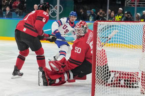 United States&rsquo; Jack Hughes (86) scores during a men&rsquo;s ice hockey gold medal game between Canada and the United States at the 2026 Winter Olympics, in Milan, Italy, Sunday, Feb. 22, 2026. (Hassan Ammar / The Associated Press)
