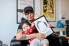 Mike Sudoma/Free Press
                                Winnipeg artist Dee Barsy and her daughter Emmylou hold a drawing of Emmylou done by Richard Daniels, with lettering by Bram Adey, a local tattoo artist.
