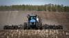 JEFF MCINTOSH / THE CANADIAN PRESS FILES
                                David Reid drives a seeding rig as he plants a wheat crop near Cremona, Alta. Wheat is grown on nearly 50,000 farms in Canada, but fertilizer cost issues this season may alter that number.