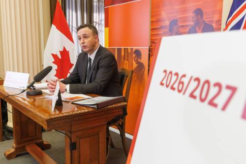 MIKE DEAL / FREE PRESS
                                Finance Minister Adrien Sala speaks to journalists Tuesday prior to tabling the budget in the Manitoba Legislative Assembly.