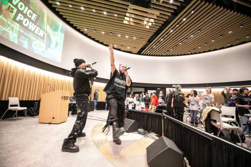 photos by MIKAELA MACKENZIE / FREE PRESS
                                Quinton (Yung Trybez) Nyce (left) and Darren (Young D) Metz perform for students of Elwick Community School.