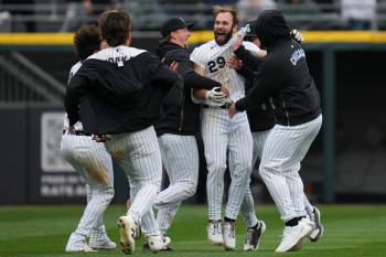 Erin Hooley / THE ASSOCIATED PRESS
                                Winkler&rsquo;s Tristan Peters (29) celebrates his game-winning walk-off RBI single with his Chicago White Sox teammates Friday over the Toronto Blue Jays.