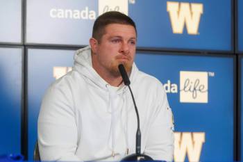 MIKE DEAL / FREE PRESS
                                Decorated linebacker Adam Bighill was emotional Tuesday at Princess Auto Stadium as he officially hung up his cleats on his CFL career as a Winnipeg Blue Bomber.