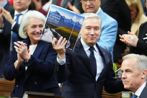 The Canadian Press
                                Federal Finance and National Revenue Minister Francois-Philippe Champagne holds up the book of the spring economic update as he delivers it in the House of Commons on Parliament Hill in Ottawa on April 28.