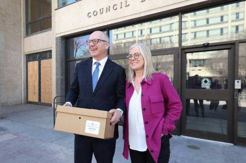 Ruth Bonneville / Free Press
                                Scott Gillingham and his wife Marla are all smiles after he officially registered his bid to be re-elected to a second term as Winnipeg mayor at city hall, Friday.