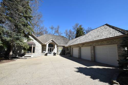 This elegant 3,209 sq. ft. bungalow is in an amazing location.