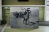 SANDEEP SINGH PHOTO
                                The exhibit includes a reproduction of a historic photo by photojournalist Ariel Varges
                                showing men of the 45th Sikhs (52nd Infantry Brigade, 17th Division)
                                marching with the Guru Granth Sahib to attend a Diwan (religious
                                service) while on campaign in Mesopotamia.