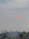 Russell Wangersky / Free Press Files
                                The sun behind forest fire smoke over Portage Avenue
