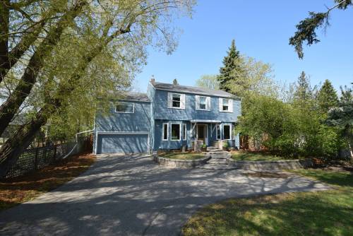 TODD LEWYS PHOTOS / FREE PRESS
                                259 Churchill Dr. is situated on a mature, extra-deep lot across from the river in gorgeous Riverview.