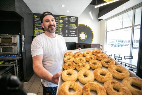 MIKAELA MACKENZIE / FREE PRESS 
                                Bagelsmith owner Phil Klein at his Taylor Avenue location on Wednesday. A bag of bagels is already PST exempt, but a Bagelsmith sandwich &mdash; a prepared food &mdash; is not.