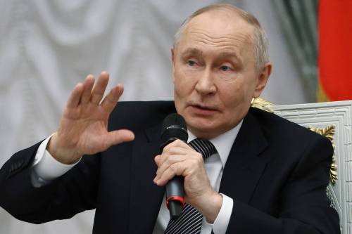 Sergei Bulkin, Sputnik, Kremlin Pool Photo via AP
                                Russian President Vladimir Putin speaks to graduates of the Time of Heroes educational program, for those who fought in Ukraine, at the Kremlin in Moscow, May 22.