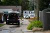 DANIEL CRUMP / FREE PRESS FILES 
                                Police at the scene of the 2022 shooting in a lane behind Bernier Bay in Windsor Park.