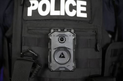 A constable with the Brandon Police Service wears a body-worn video camera. (Tim Smith / The Brandon Sun files)