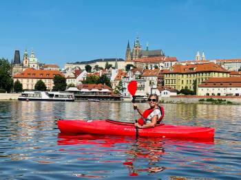 STEVE MACNAULL PHOTOs
                                The Prague on Kayak tour glides by Prague Castle in the background.