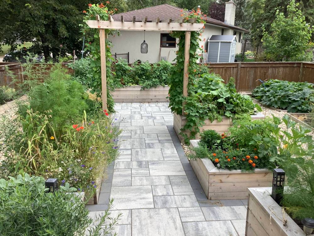 LYNNE HERMISTON PHOTO
                                A food gardener&rsquo;s delight: visit a raised bed garden filled with veggies and herbs on this year&rsquo;s MMGA garden tour.