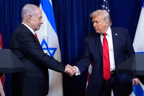 The Associated Press
                                U.S. President Donald Trump shakes hands with Israeli Prime Minister Benjamin Netanyahu at a news conference. Columnist Gwynne Dyer argues the clock is ticking for both.