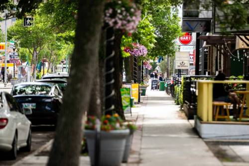 MIKAELA MACKENZIE / FREE PRESS
                                Corydon Avenue between Lilac and Daly streets will be closed to traffic on Sundays between July 5 and Sept. 6 to allow for expanded patios and pedestrians.