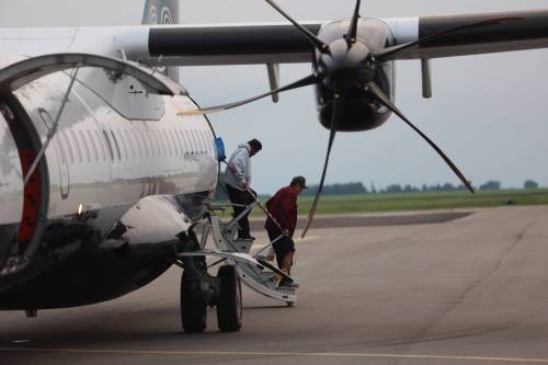 Evacuees from Lynn Lake arrive at the Brandon Municipal Airport on Saturday evening. (Abiola Odutola/The Brandon Sun files)