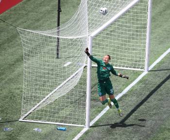 NSL PHOTO
                                Ottawa Rapid goalkeeper Melissa Dagenais punches the ball away during NSL action.
