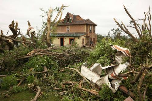 29062026 The home belonging to Brian and Bernadine Brown south of Rossburn, Manitoba on Monday after a powerful tornado hit the property on Sunday evening while Brian and Bernadine were inside. Their home, several other buildings on the property, vehicles and hundreds of trees were all heavily damaged by the tornado, but luckily escaped uninjured. (Tim Smith/The Brandon Sun)