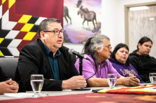 MIKAELA MACKENZIE / FREE PRESS FILES
                                Pimicikamak Cree Nation chief David Monias, left, proposed a resolution that calls on the federal government to criminalize residential school denialism as hate speech at the Assembly of First Nations annual general assembly in Ottawa, Tuesday.