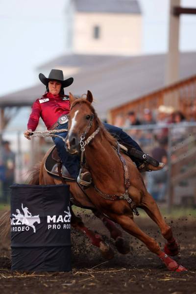 Ferrah Fogg rounds a barrel atop her horse during the ladies barrel racing event during last year&rsquo;s event. (Tim Smith / The Brandon Sun files)