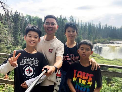 SUPPLIED
                                Yi (Rick) Zheng with his wife and their two sons at Pisew Falls last summer. They would be thrilled to continue living in Thompson.