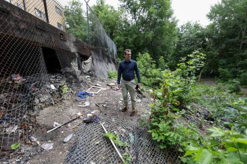 RUTH BONNEVILLE / FREE PRESS
                                The city ordered Marvin Sharp to remove the encampment from the Pen-Eve Apartments at 35 Balmoral St., along with the associated garbage and debris, or have the cost of the cleanup added to his property tax bill.