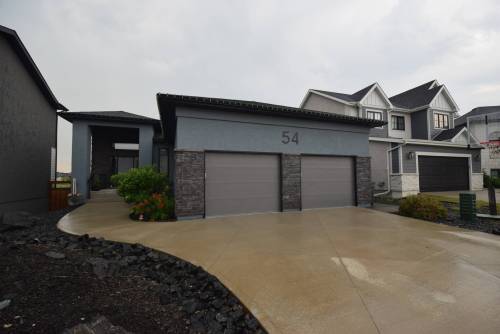 This sprawling walk-out bungalow at 54 Camira Way offers over 3,000 sq. ft. of intelligently designed &mdash; and beautifully finished &mdash; space between its upper and lower levels.