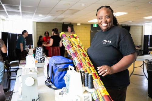 MIKAELA MACKENZIE / FREE PRESS FILES
                                Pavilion coordinator Abigail Larson said 32 people helped sew new outfits all day Friday and Saturday.